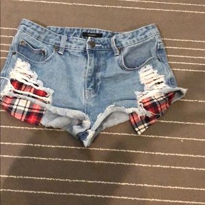 Jean shorts with red white and blue pockets